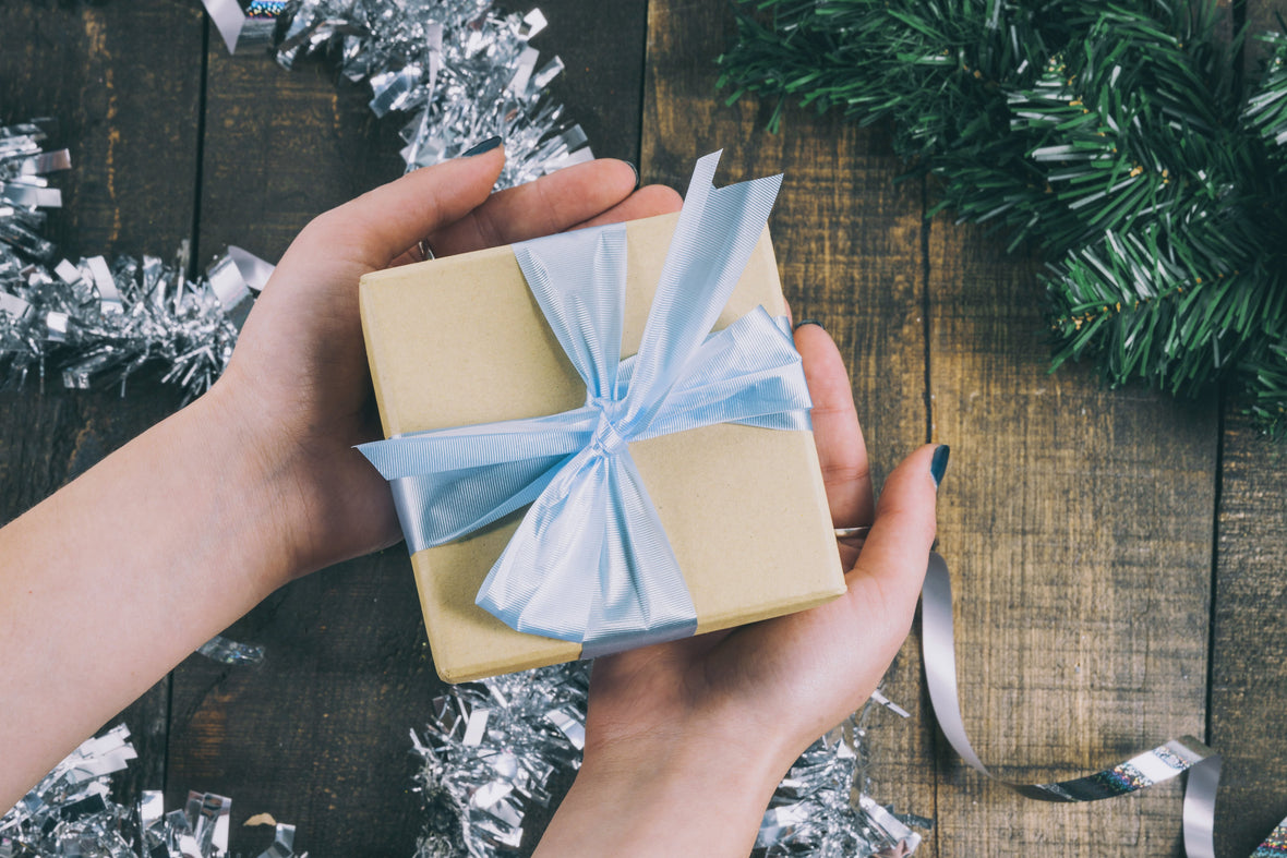 Two hands with a present