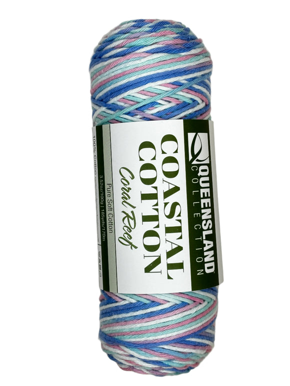 pink teal blue white skein of yarn