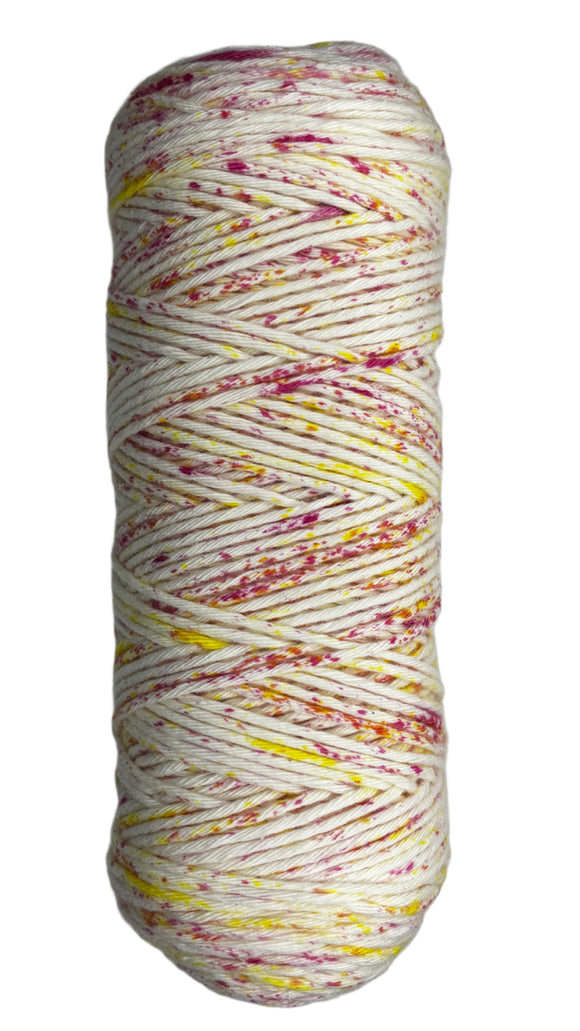 Red, orange, yellow speckled skein of yarn
