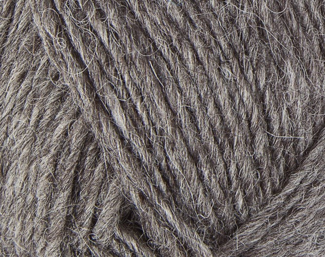 A close up photo of gray Istex Lettlopi yarn