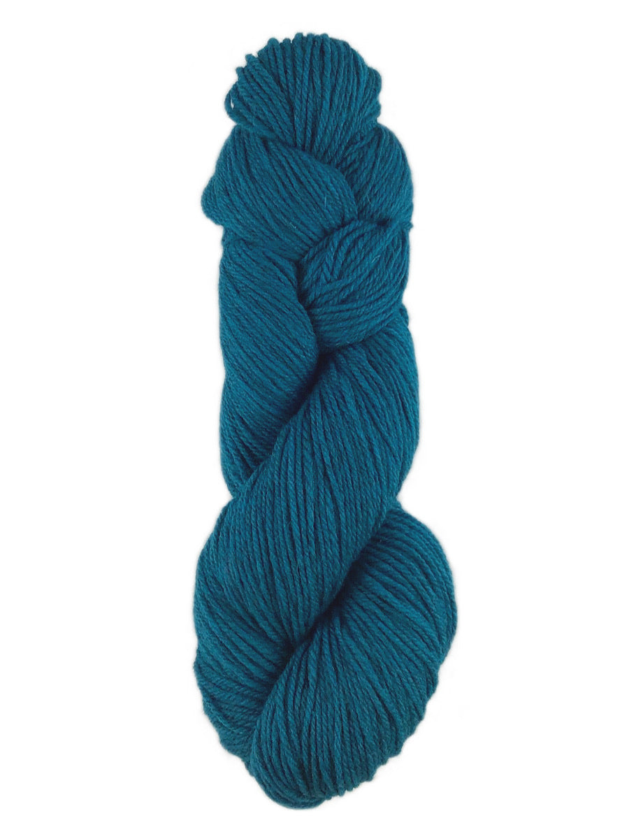 A blue skein of Brown Sheep Prairie Spun DK yarn