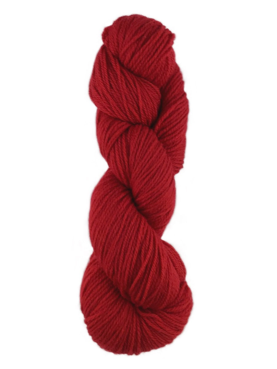 A red skein of Brown Sheep Prairie Spun DK yarn