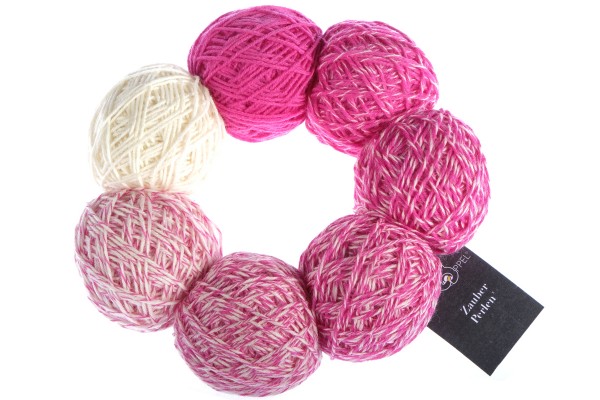 A white and pink set of Schoppel Zauber Perlen yarn balls