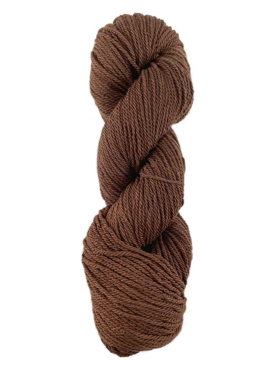A brown skein of Mountain Meadow Wool Cora yarn