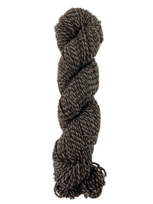 A neutral tweed skein of Mountain Meadow Wool Tweed Sport yarn
