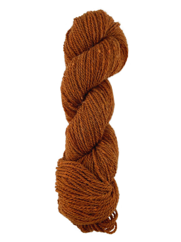 An orange skein of Mountain Meadow Wool Mountain Down yarn