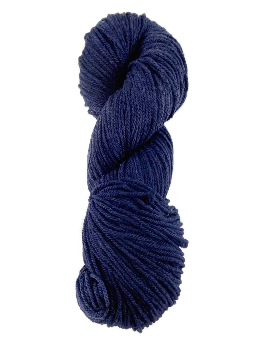 A dark blue hank of the Mountain Meadow Wool Alpine collection.