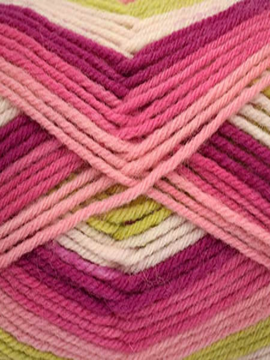 Close up of a skein of Deluxe Stripes in colorway 301 Dragonfruit