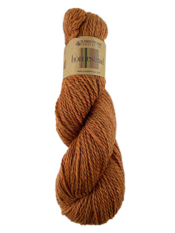 An orange skein of Plymouth Homestead yarn