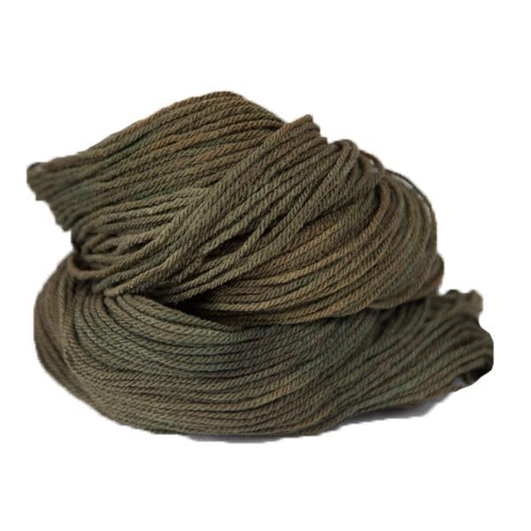 A brown hank of the Mountain Meadow Wool Alpine collection.