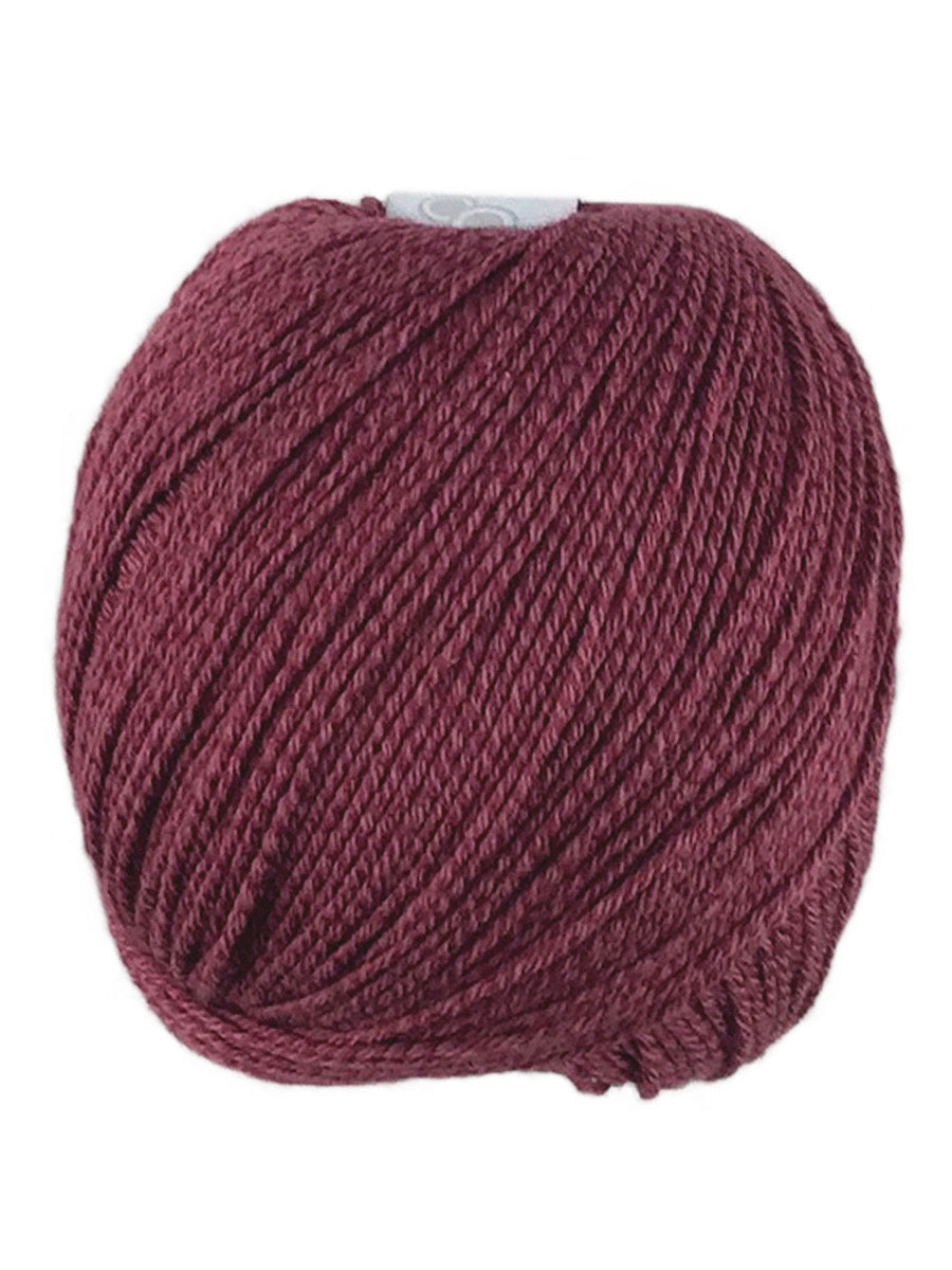 A red skein of Universal Bamboo Pop yarn