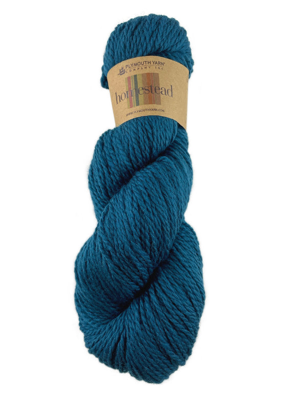 A blue skein of Plymouth Homestead yarn