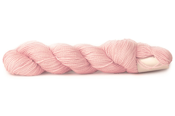 A photo of a light pink hank of CoBaSi sock yarn.