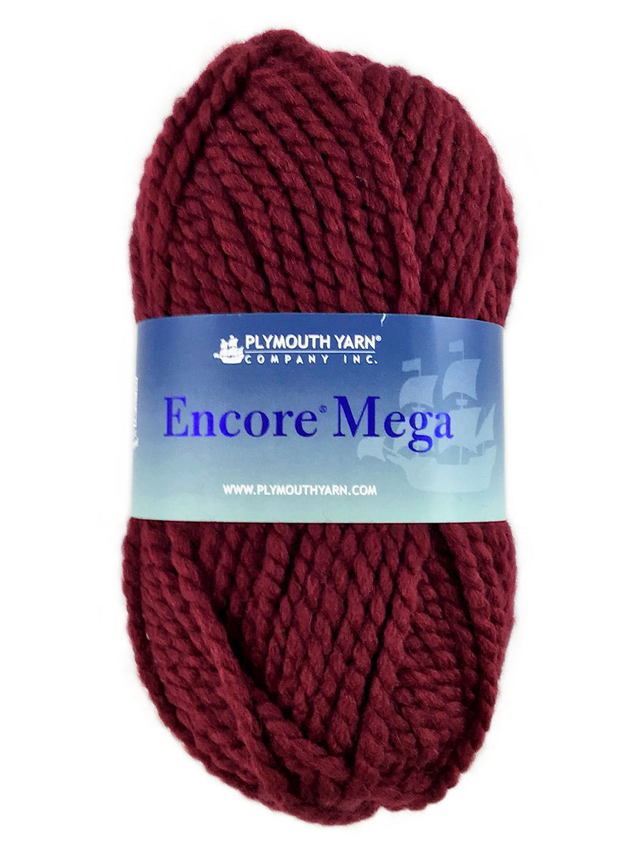 A red skein of Plymouth Encore Mega yarn
