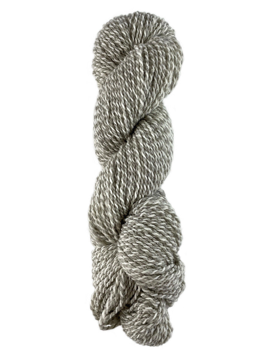 A neutral tweed skein of Mountain Meadow Wool Tweed Sport yarn