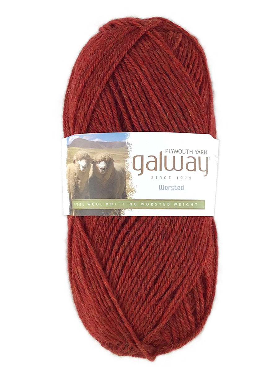 A red skein of Plymouth Galway yarn