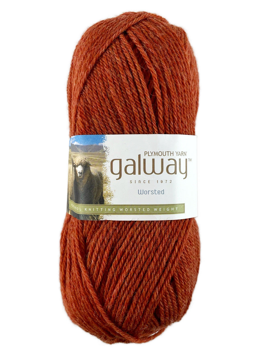 An orange skein of Plymouth Yarn Galway yarn
