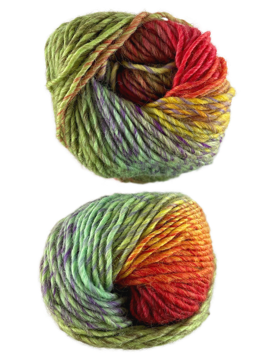 A photo of two green, purple and red skeins of yarn