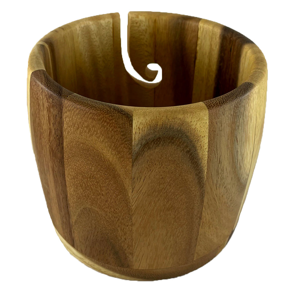 A wooden yarn bowl made from Beli Wood