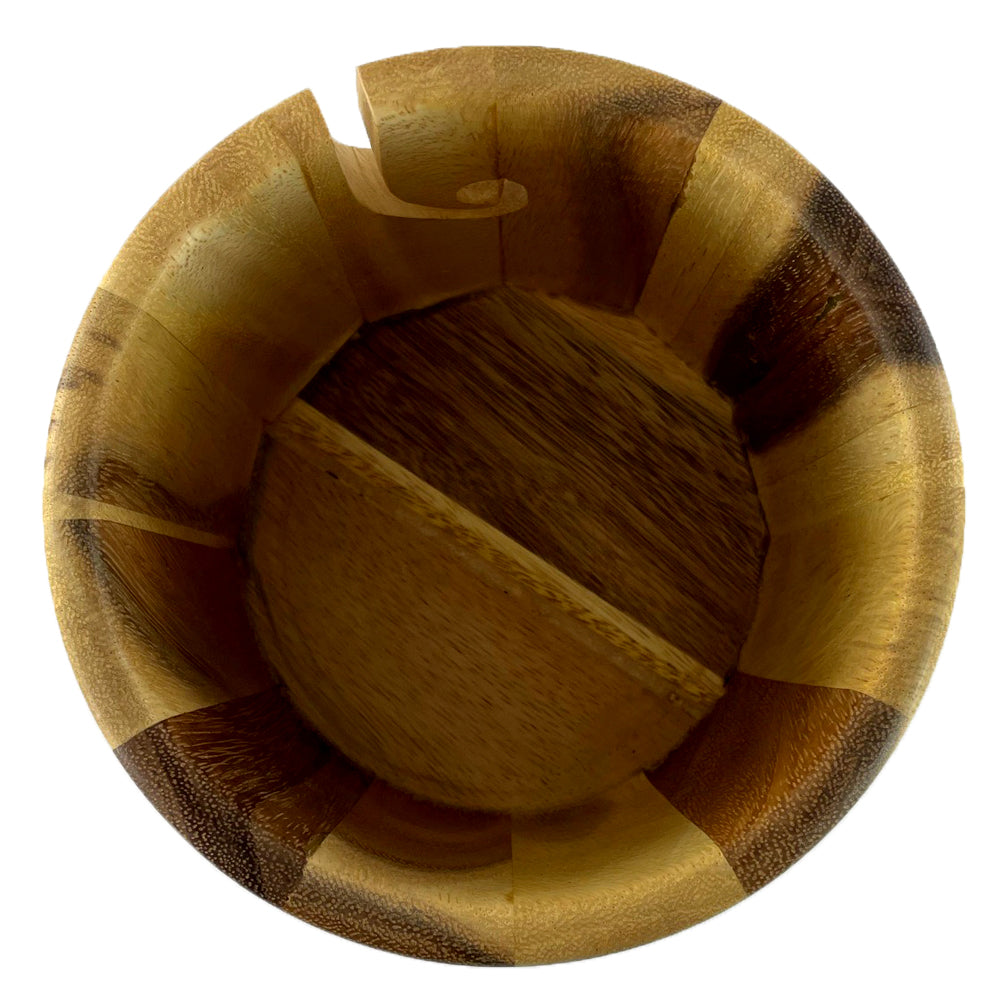 The inside of a wooden yarn bowl made from Beli Wood