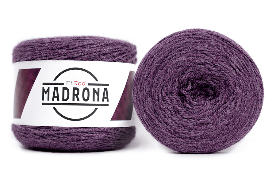A photo of two skeins of purple Madrona