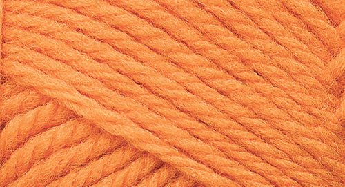 A close-up photo of an light orange sample of Nature Spun yarn