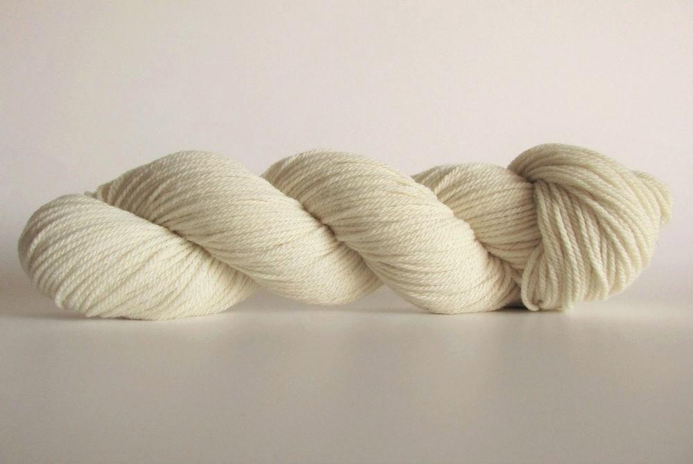 A natural colored hank of the Mountain Meadow Wool Alpine collection.