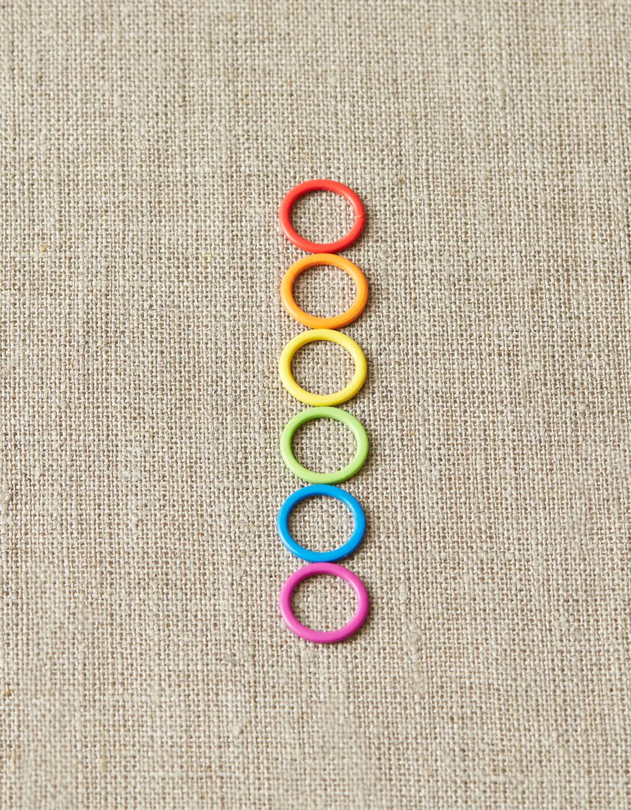 Cocoknits Colorful Ring Stitch Markers on linen background
