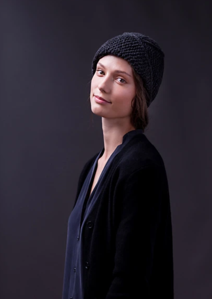A woman wearing a knitted hat
