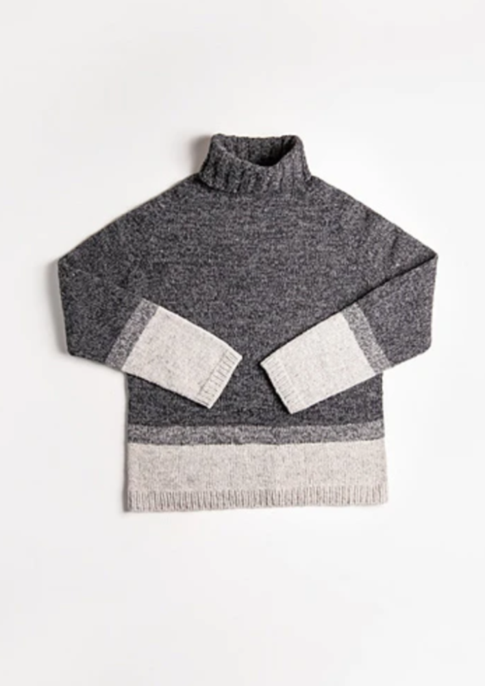 A knitted turtleneck sweater