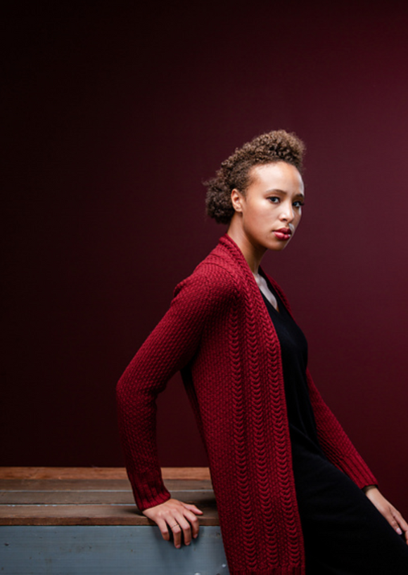 A woman wearing a knitting cardigan