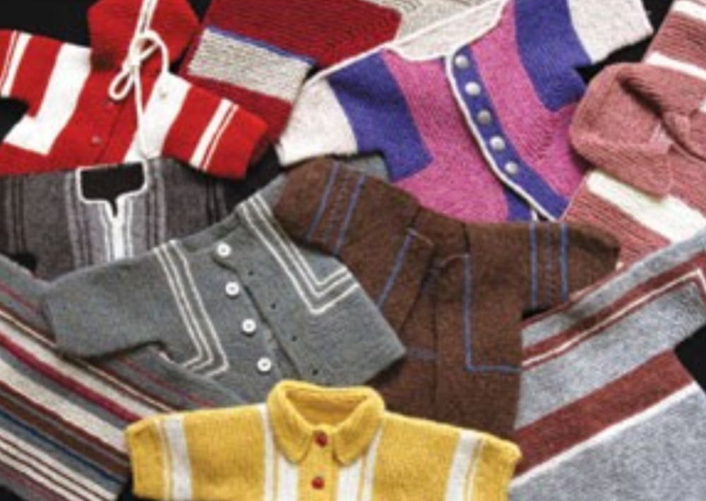 A group of knitted children's jackets