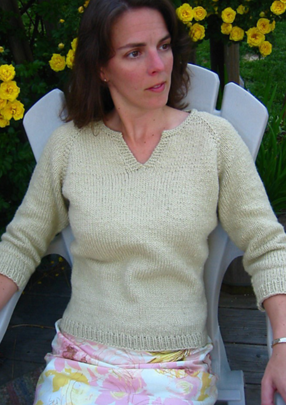 A woman wearing a knitted sweater