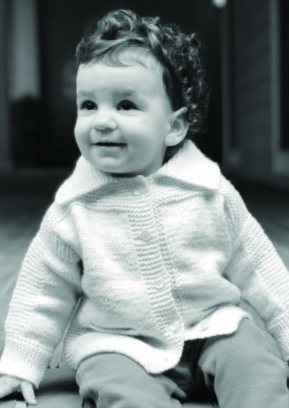 A baby wearing a knitted sweater