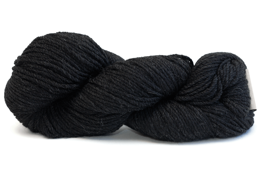 A photo of a black hank of Simplinatural yarn.