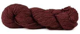 A photo of a wine colored hank of Simplinatural yarn.