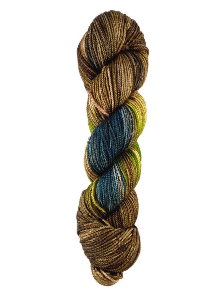 A copper, greenish teal and yellow skein of Western Sky Knits Merino 17 DK yarn