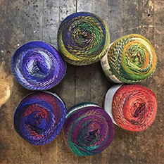 Multiple skeins of colorful yarn