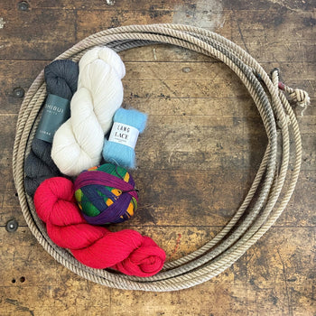 A lariat filled with lace weight yarn