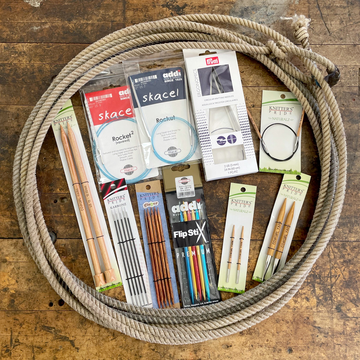 A lariat filled with knitting needles
