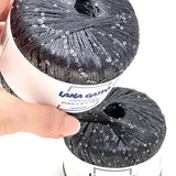 Two skeins of a black Paillettes yarn