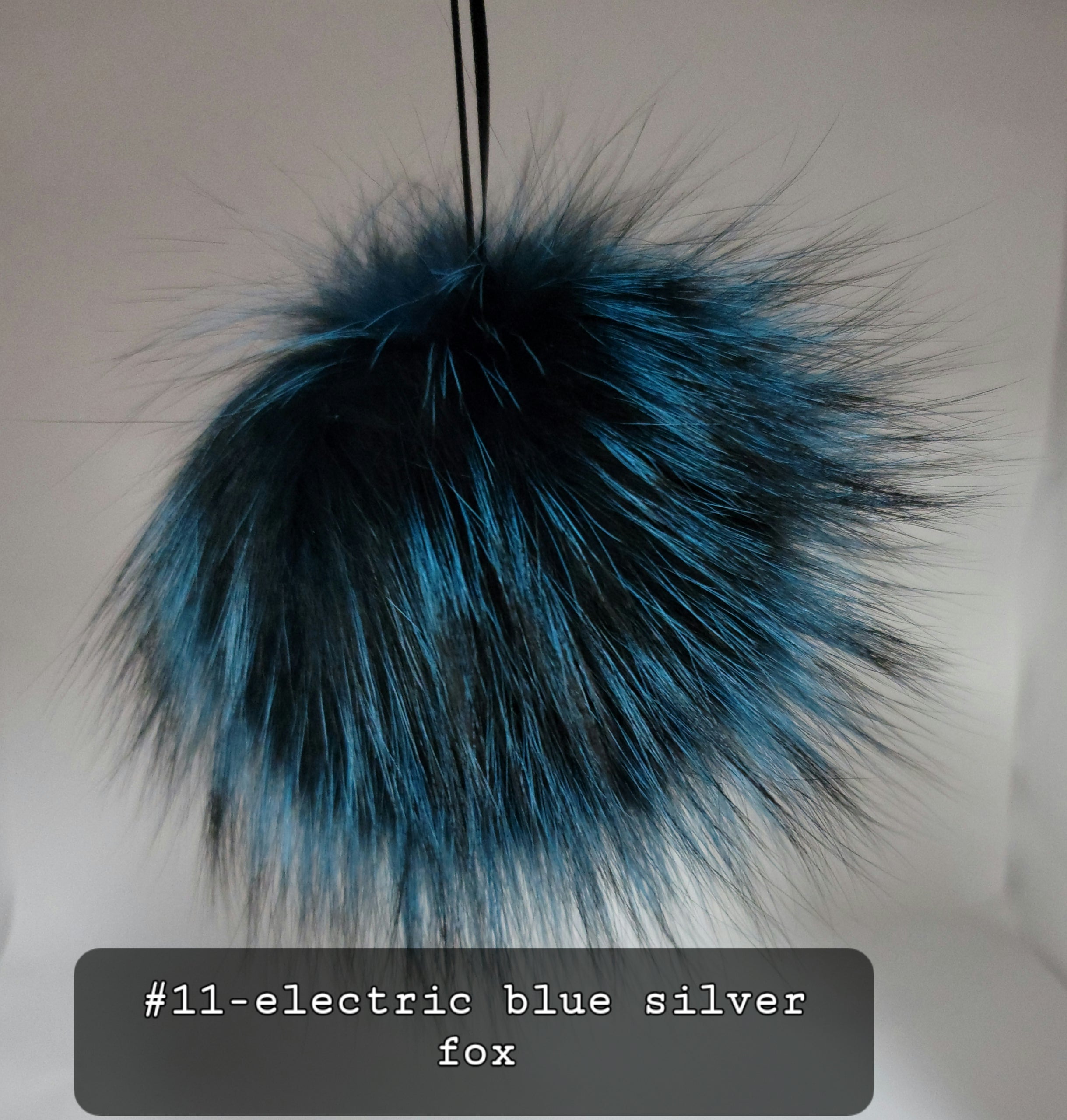 Fur Pompoms Small by Schildkraut color blue and black