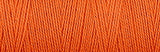 Upclose shot of 8/2 Organic Weaving Cotton in the color orange