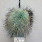 Fur Pompoms Small by Schildkraut color sage and tan