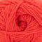Close-up of a ball of bright red yarn