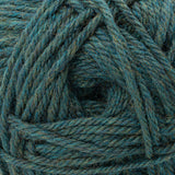 A close-up of a ball of yarn in a heathered teal blue-green color, showing the twisted plies and soft texture.