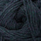 A close-up of dark teal and purple variegated yarn wound in a spiral pattern, showing the thick twisted texture of the fibers.