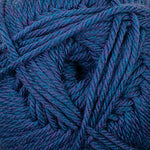 A close-up of a ball of twisted yarn in a heathered periwinkle blue and purple colorway.