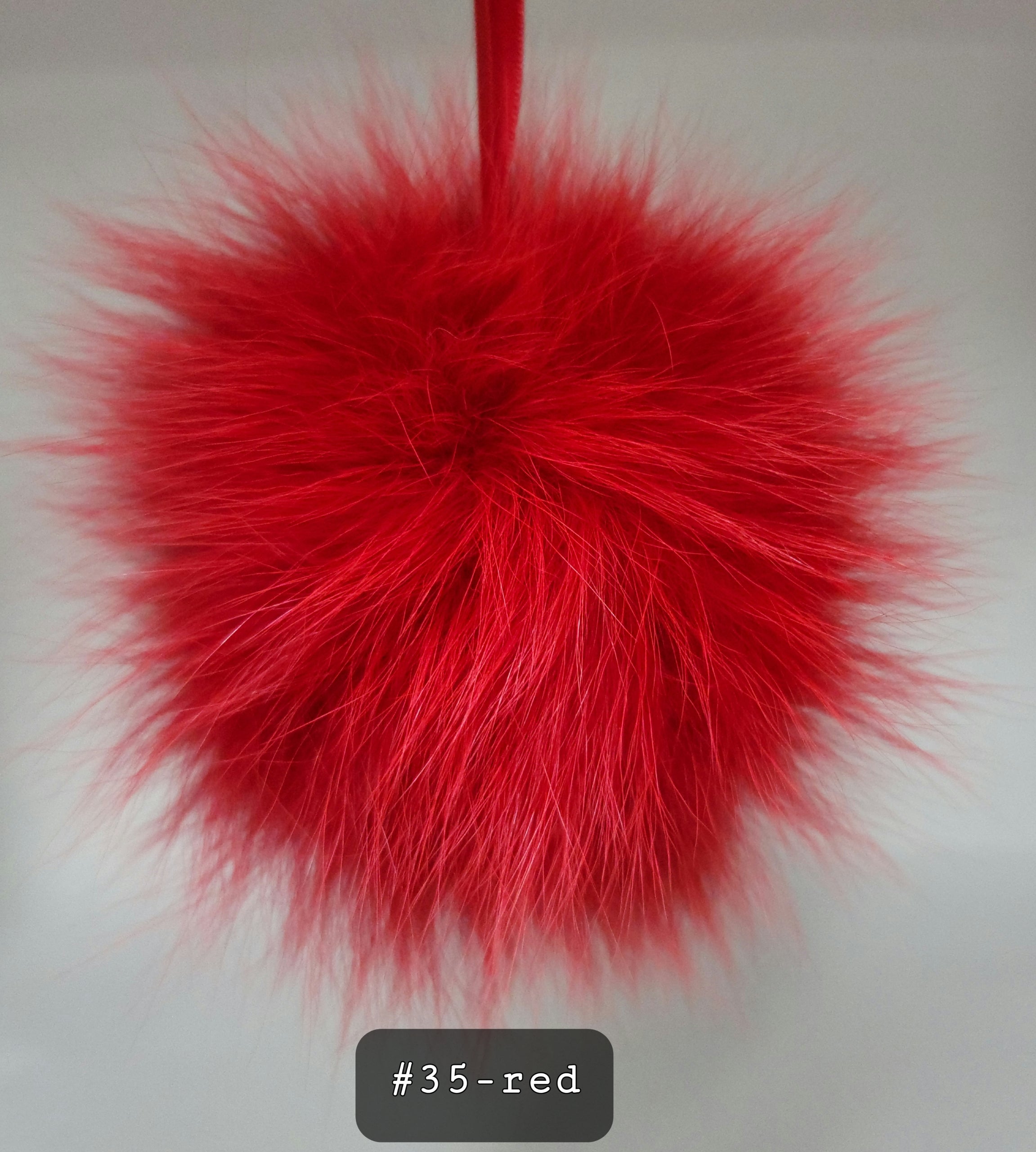 Fur Pompoms Small by Schildkraut color red
