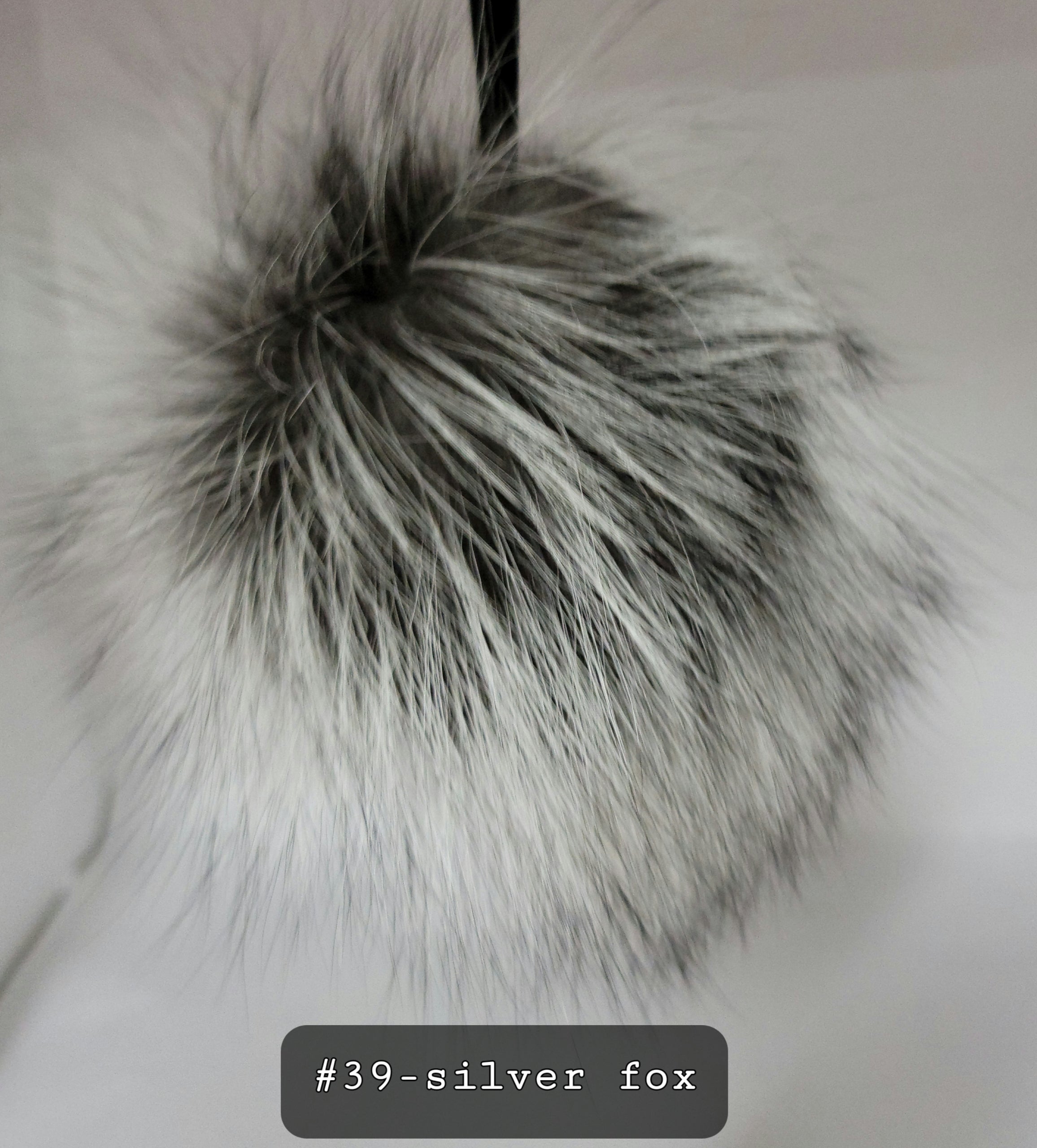 Fur Pompoms Small by Schildkraut color  black and silver
